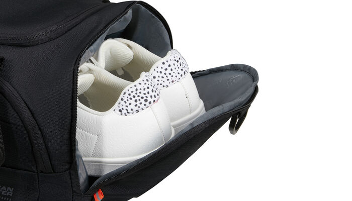 Poche latérale pour chaussures